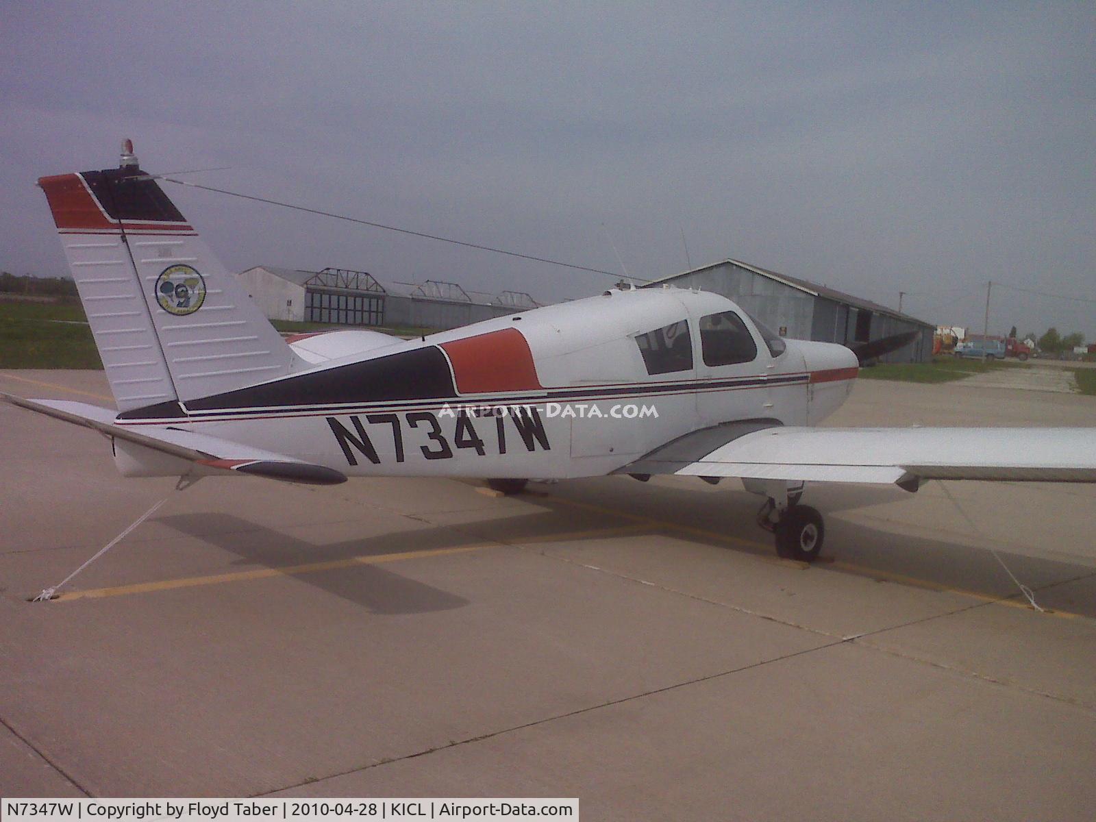 N7347W, 1963 Piper PA-28-180 C/N 28-1224, Sitting on the ramp on a windy day in Clarinda