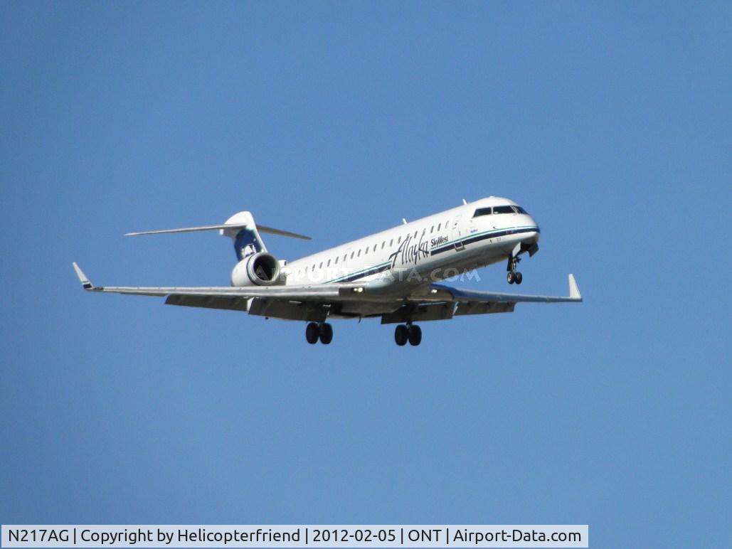 N217AG, 2001 Bombardier CRJ-701 (CL-600-2C10) Regional Jet C/N 10031, Alaska Airlines flt 3461 on final to runway 8L