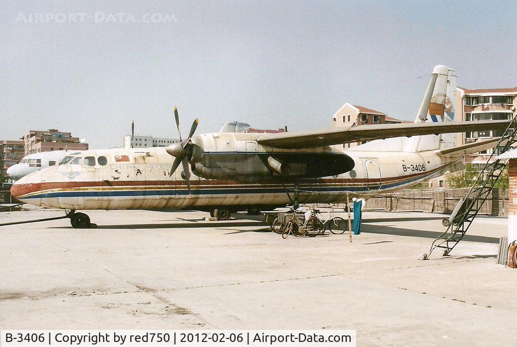 B-3406, 1971 Antonov An-24B C/N 17307105, Photograph by Edwin van Opstal with permission. Scanned from a color print. A very sorry looking aircraft.