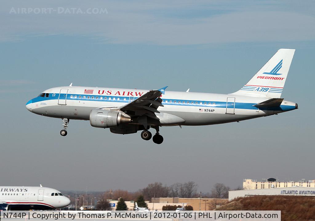 N744P, 2000 Airbus A319-112 C/N 1287, Touching down on 27R at PHL