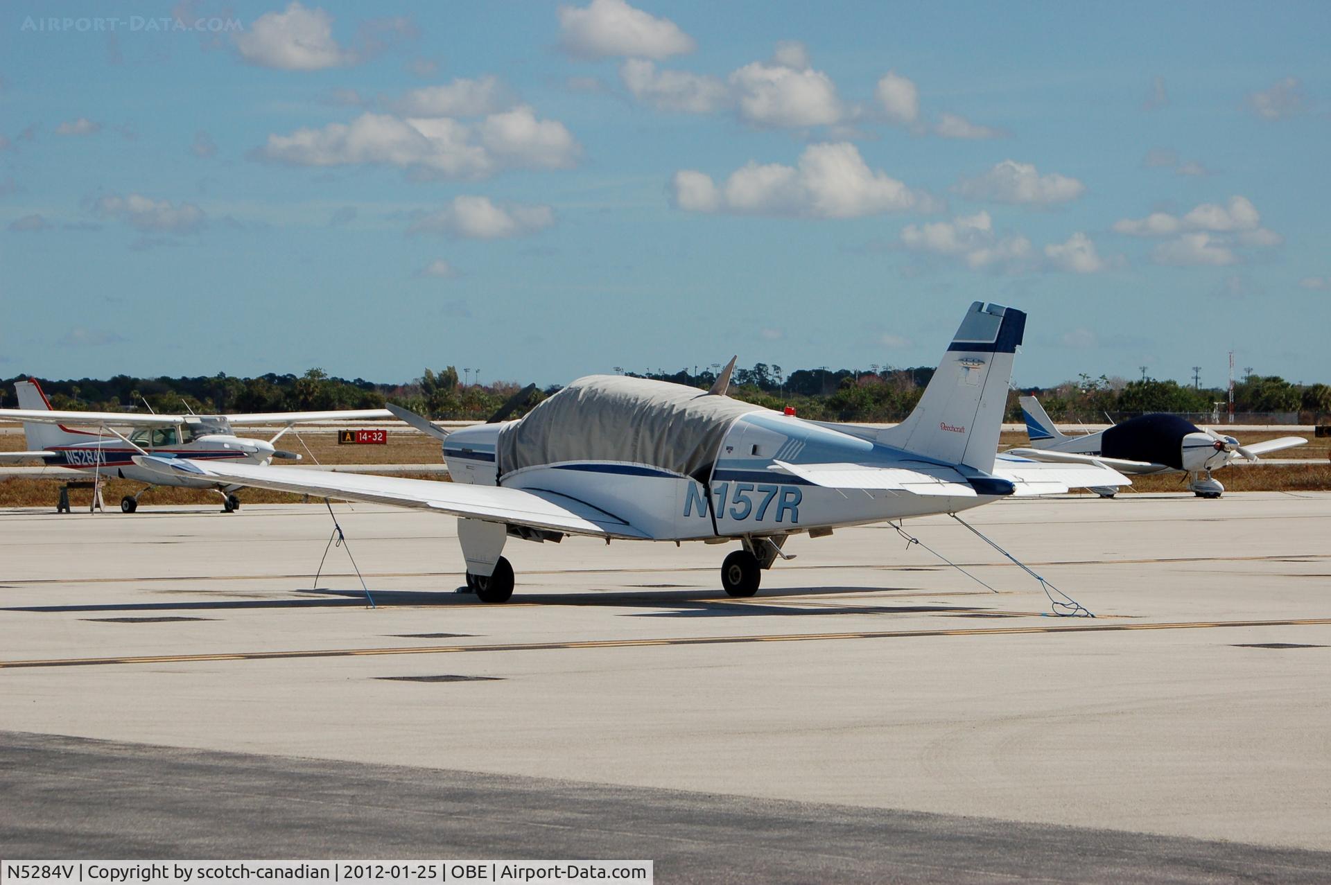 N5284V, 1980 Cessna 172RG Cutlass RG C/N 172RG0494, 1980 Cessna 172RG N5284V in the background and 1991 Beech F33A N157R in the foreground at Okeechobee County Airport, Okeechobee, FL