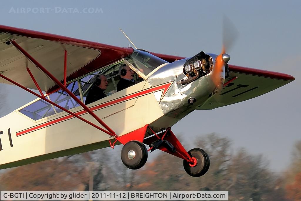 G-BGTI, 1944 Piper L-4J Grasshopper (J3C-65D) C/N 12940, Having gained some composure, mine!! I got the steep climb away from it's rather firm encounter with terra firma with the back seater in control I would guess. I have to say the following touch and go's were pretty good thankfully.