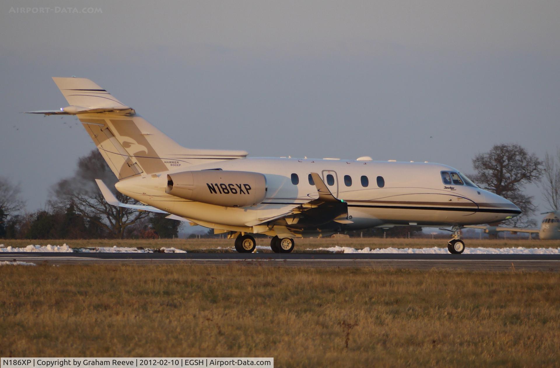 N186XP, 2011 Hawker Beechcraft 900XP C/N HA-0186, About to take off.