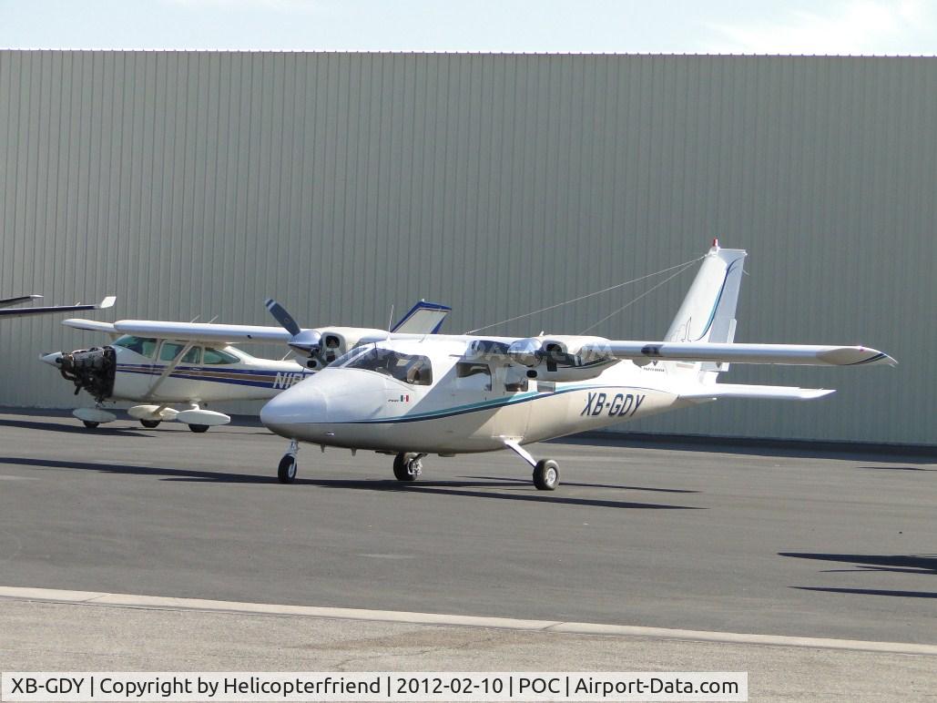 XB-GDY, Partenavia P-68C C/N 214, Moved back out of the way at Howard Aviation