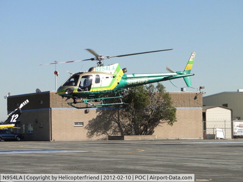 N954LA, 2010 Eurocopter AS-350B-2 Ecureuil Ecureuil C/N 4999, Air taxiing behind N963SD and headed towards taxiway Sierra