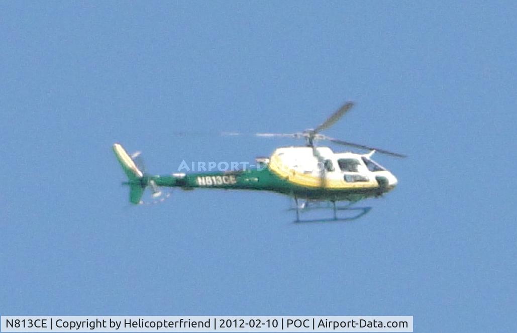 N813CE, 2004 Eurocopter AS-350B-3 Ecureuil Ecureuil C/N 3830, With permission, passing through the area of final approach to runway 26, approximately 1 mile east at 2500 feet
