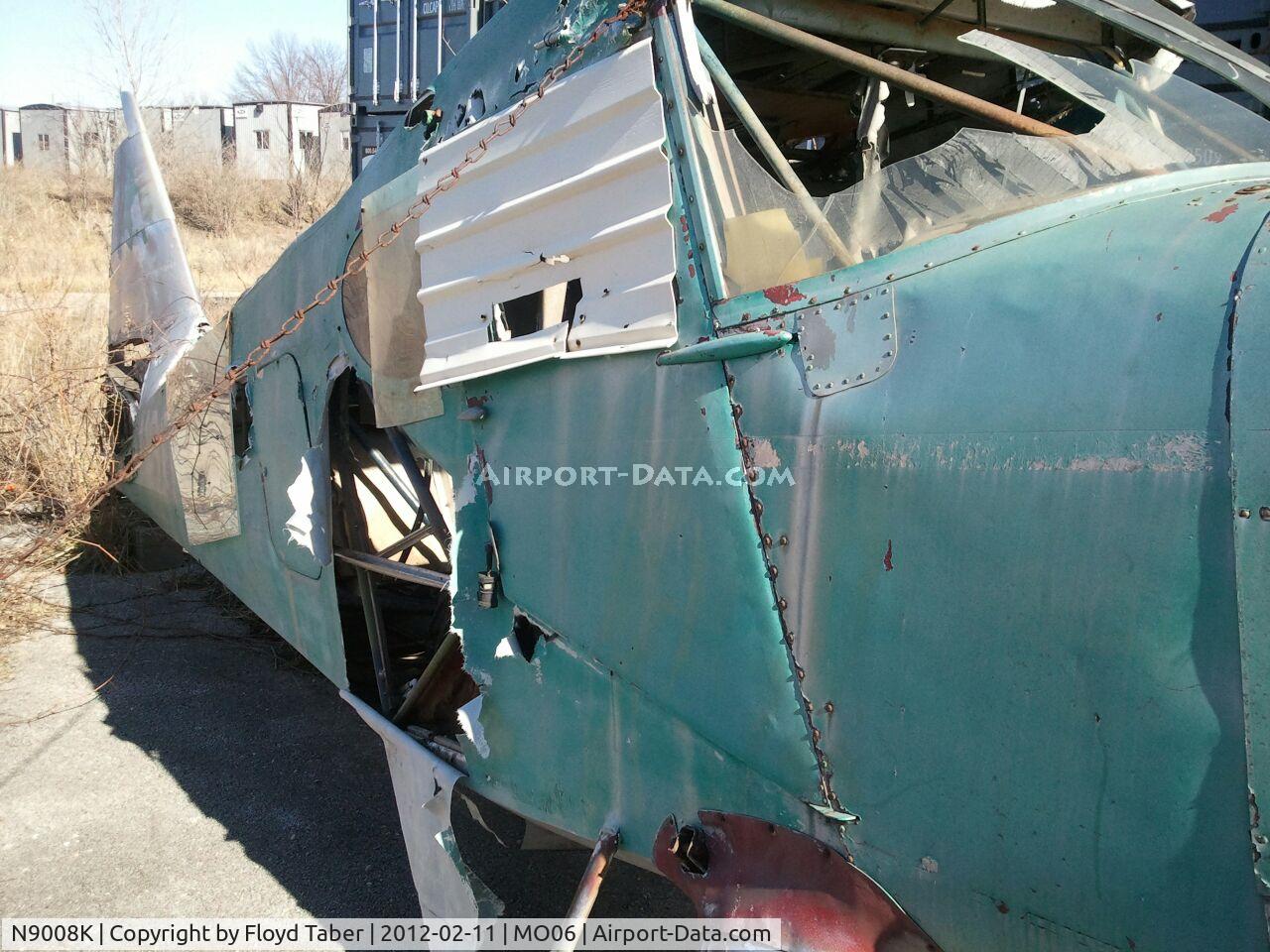 N9008K, 1947 Universal Stinson 108-1 C/N 108-2008, Sitting to rot at the remnants of what used to be Heart of America Airport MO06 that was also abandoned around 1996
