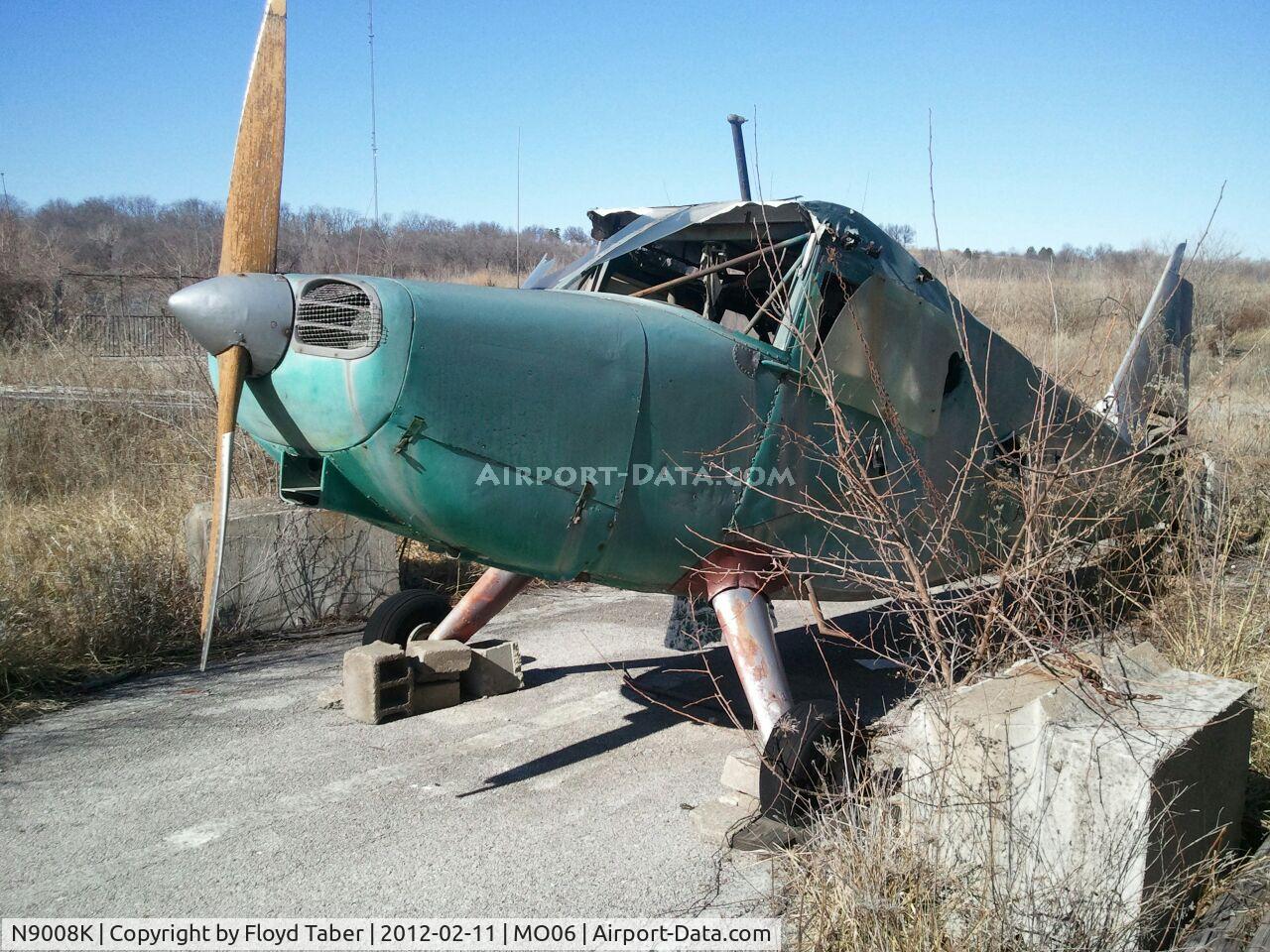 N9008K, 1947 Universal Stinson 108-1 C/N 108-2008, Sitting to rot at the remnants of what used to be Heart of America Airport MO06 that was also abandoned around 1996
