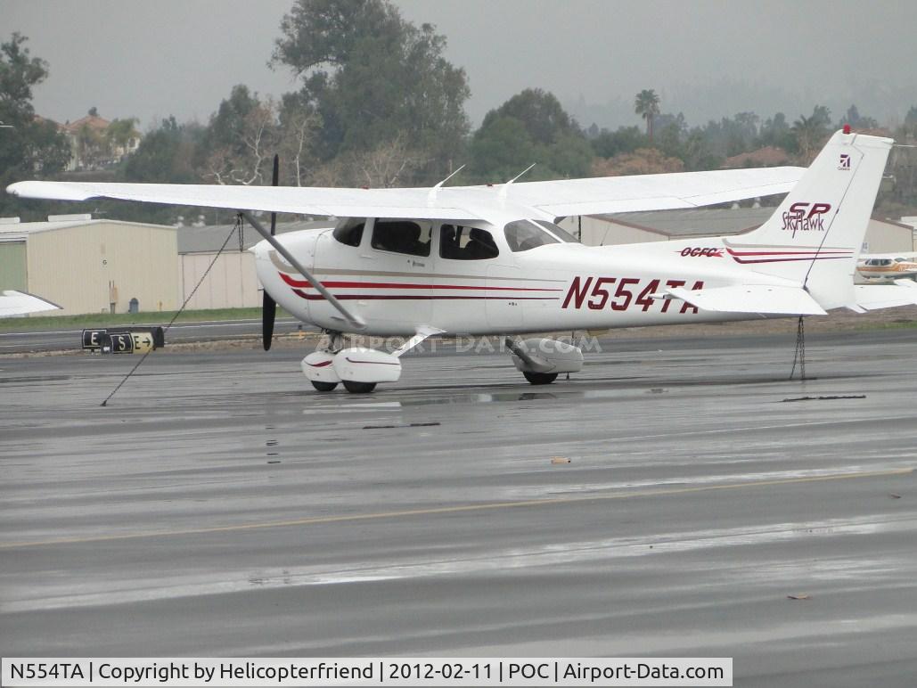 N554TA, 2003 Cessna 172S C/N 172S9455, Tied down and parked in transient parking