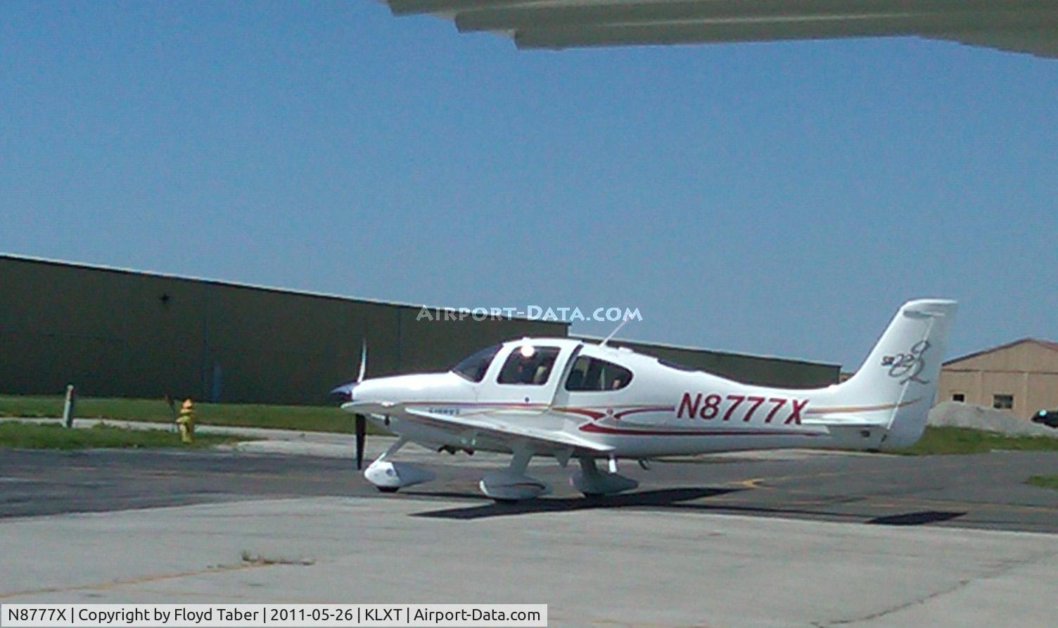 N8777X, 2004 Cirrus SR22 G2 C/N 1011, Just landed and taxied to ramp area Lees Summit