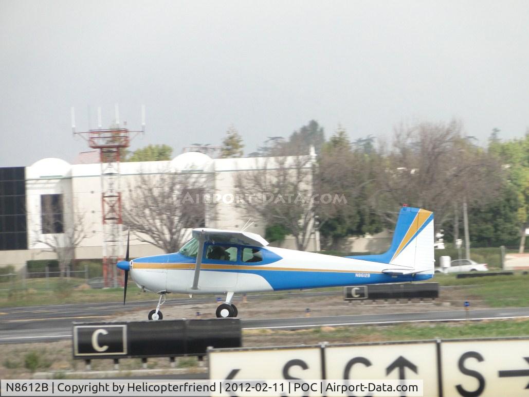 N8612B, 1957 Cessna 172 C/N 36312, Rolling out passing taxiway Cocco after landing on 26L