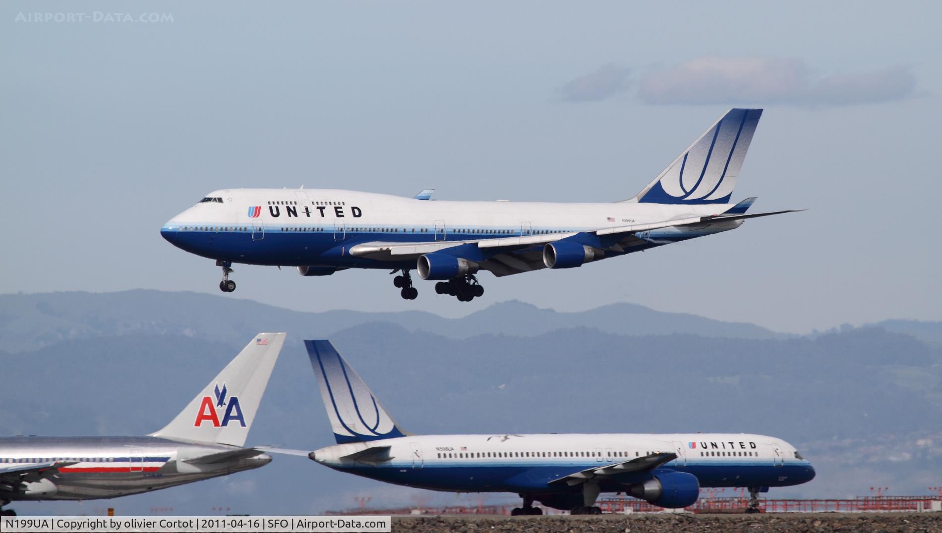 N199UA, 1997 Boeing 747-422 C/N 28717, always a lot of traffic at sfo...
