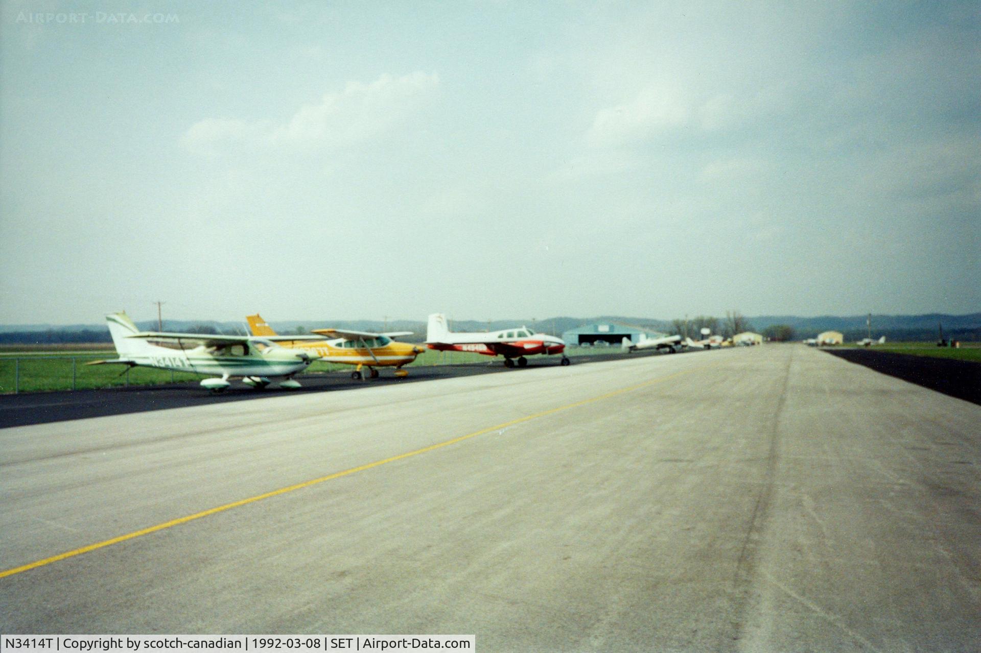 N3414T, 1967 Cessna 177 Cardinal C/N 17700714, Flight Line at St. Charles County Smartt Airport, St. Charles, MO. In 1992 this airfield's FAA identifier was 3SZ. 1967 Cessna 177 N3414T is the first aircraft in line.