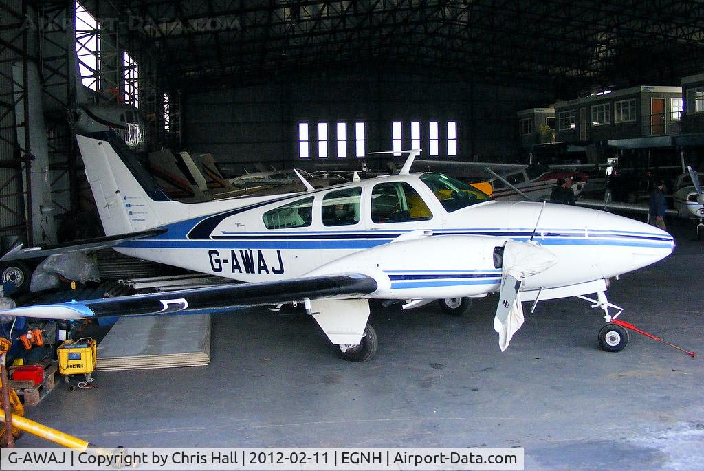 G-AWAJ, 1968 Beech D55 Baron C/N TE-536, inside the Blackpool Air Centre hangar