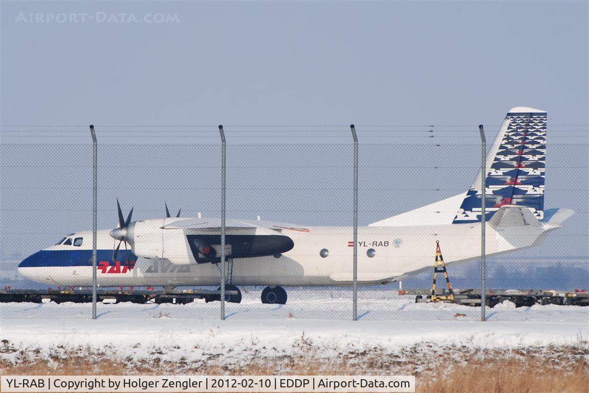 YL-RAB, 1980 Antonov An-26B C/N 7310508, Small freighter is freezing in the sun....