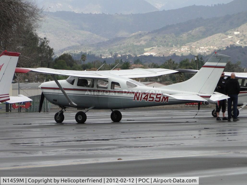 N1459M, 1969 Cessna U206E Skywagon C/N U20601459, Discussing up coming parachute jump over the drag races