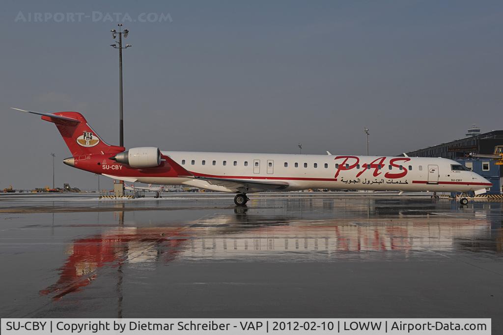 SU-CBY, 2012 Bombardier CRJ-900 NG (CL-600-2D24) C/N 15278, Petroleum Air Service Regionaljet 900 - reflection