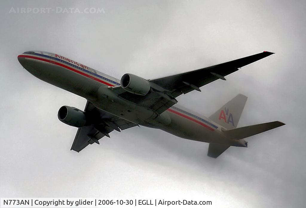 N773AN, 1999 Boeing 777-223 C/N 29583, On finals to LHR and carving a dark path thro' the low cloud!!