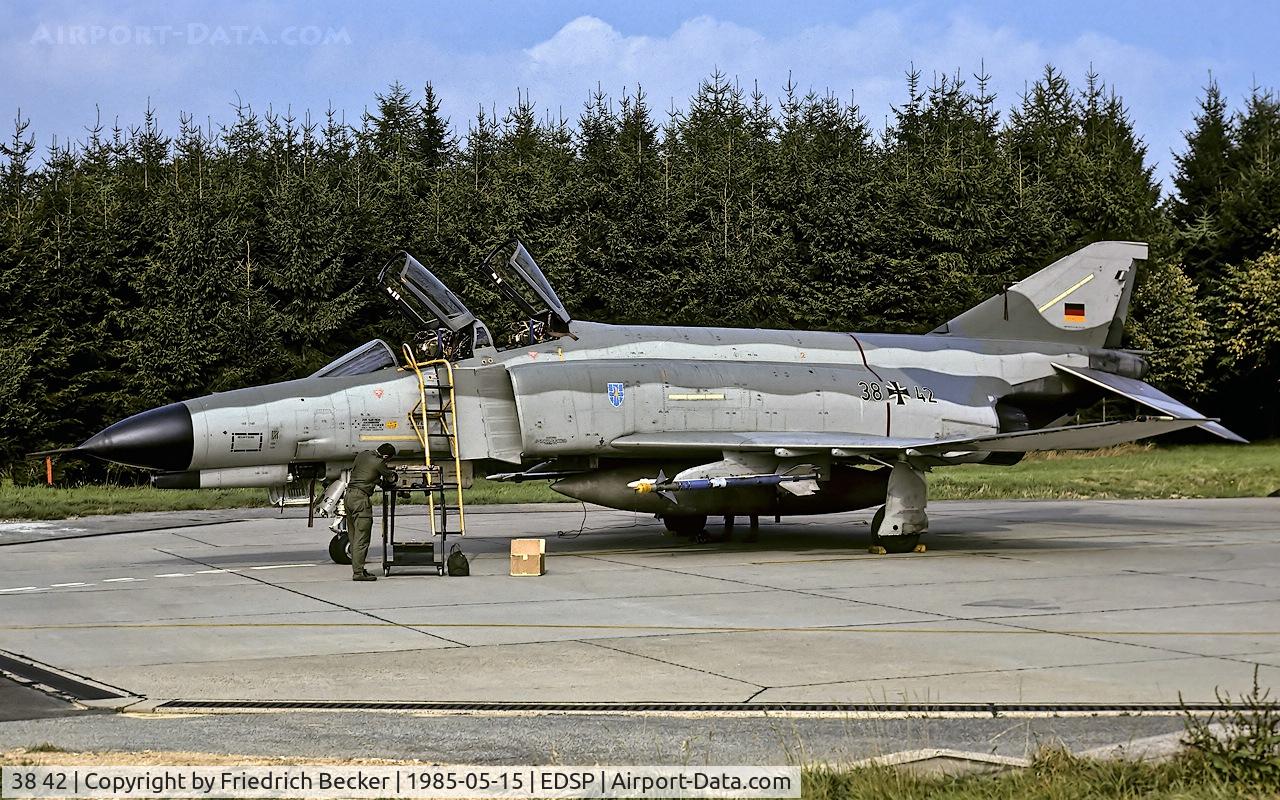 38 42, 1972 McDonnell Douglas F-4F Phantom II C/N 4731, the crew chief prepares a starter cartridge prior a training mission from Fliegerhorst Pferdsfeld