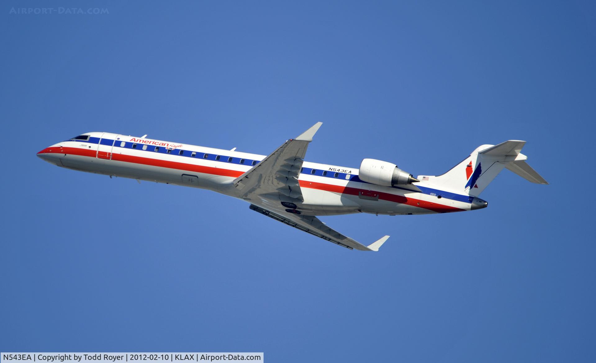 N543EA, 2011 Bombardier CRJ-700 (CL-600-2C10) Regional Jet C/N 10323, Departing LAX on 25R