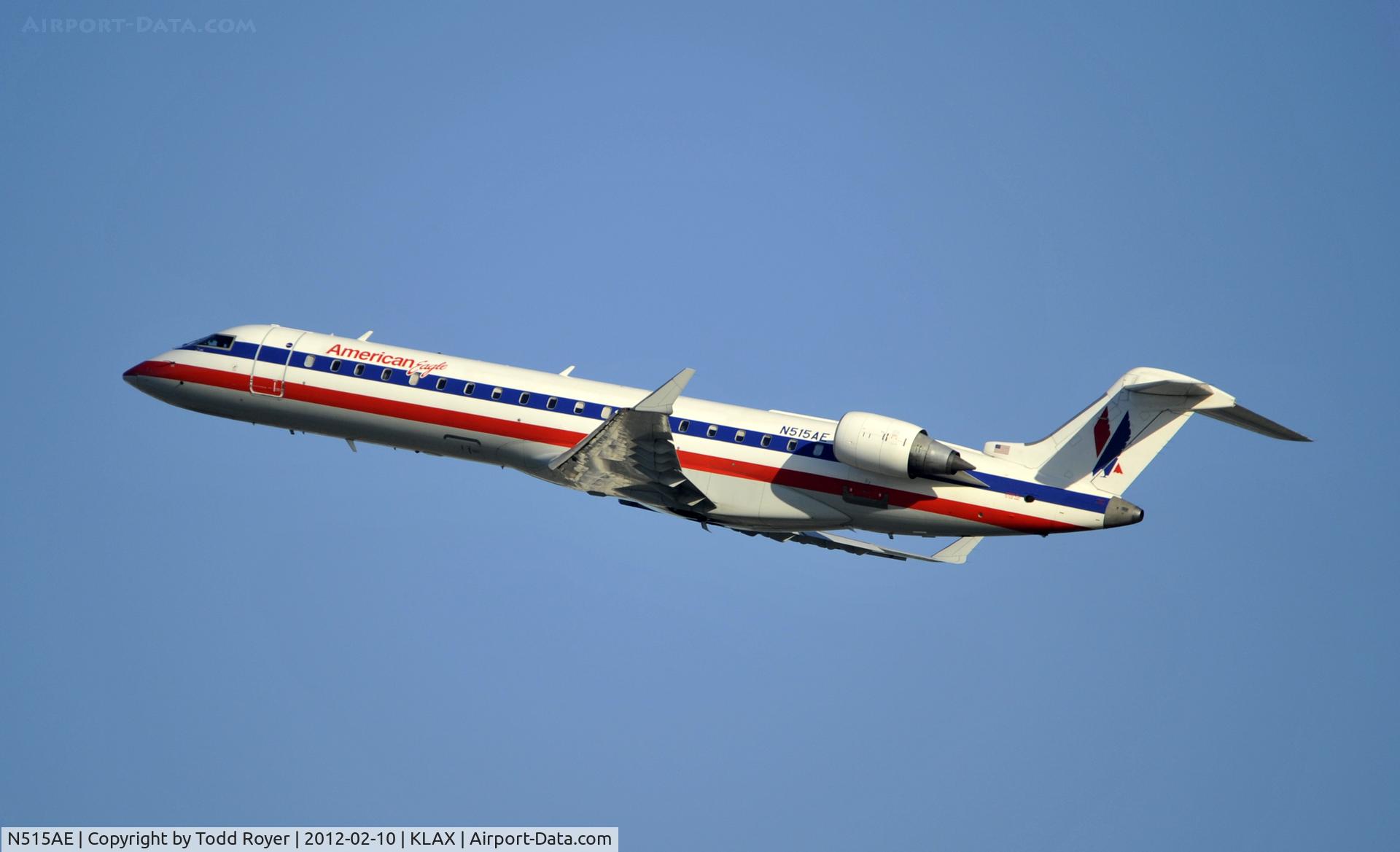 N515AE, 2003 Bombardier CRJ-701ER (CL-600-2C10) Regional Jet C/N 10121, Departing LAX on 25R