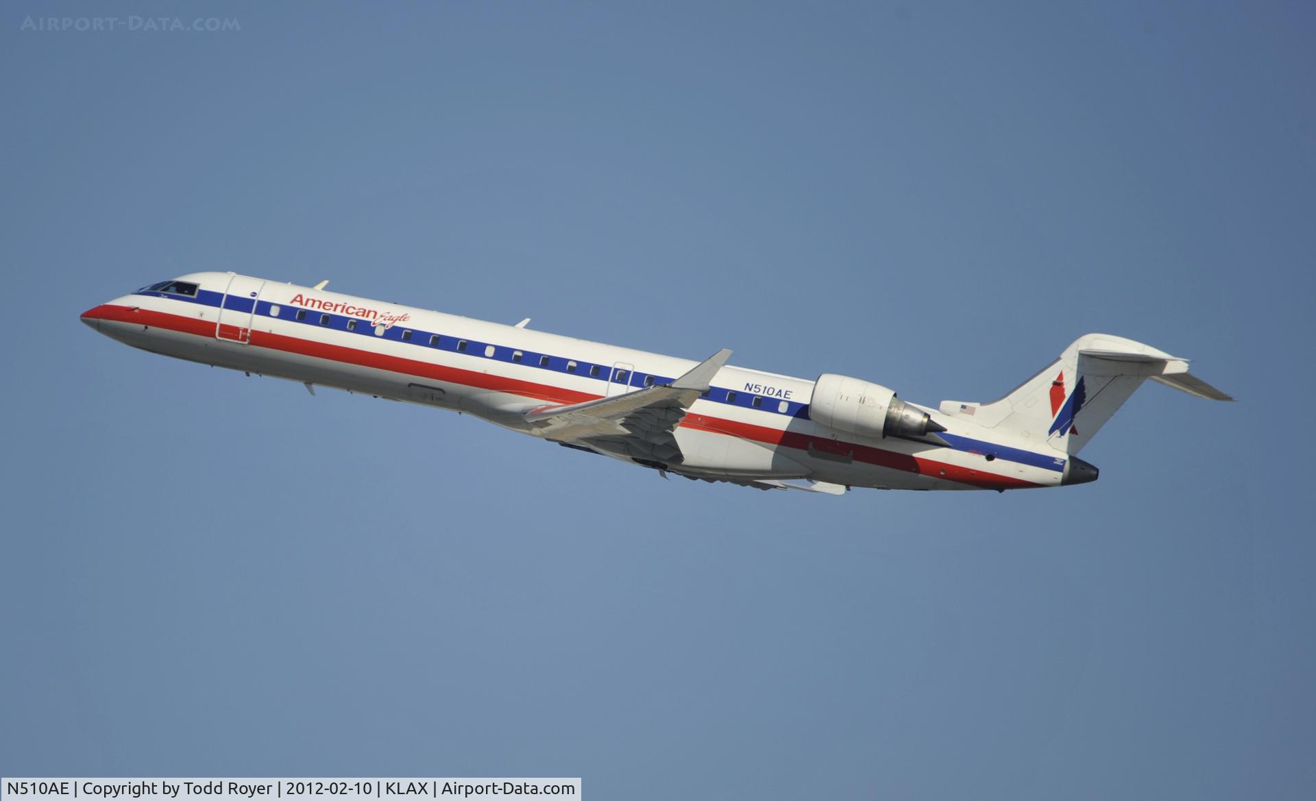 N510AE, 2003 Bombardier CRJ-701 (CL-600-2C10) Regional Jet C/N 10105, Departing LAX on 25R