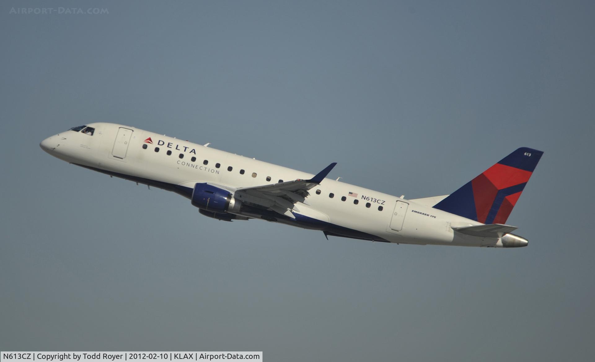 N613CZ, 2008 Embraer 175LR (ERJ-170-200LR) C/N 17000203, Departing LAX on 25R