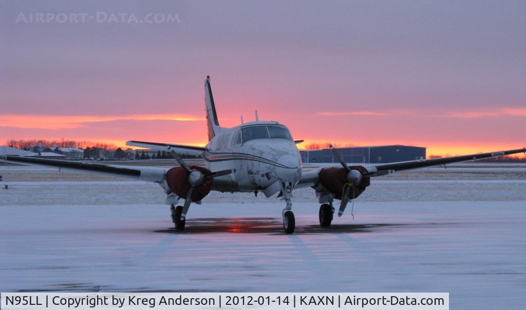 N95LL, 1965 Beech 65-A80 C/N LD-235, Beech 65-A80 Queen Air from Bemidji Aviation Services sitting on the ramp as the January sun sets.