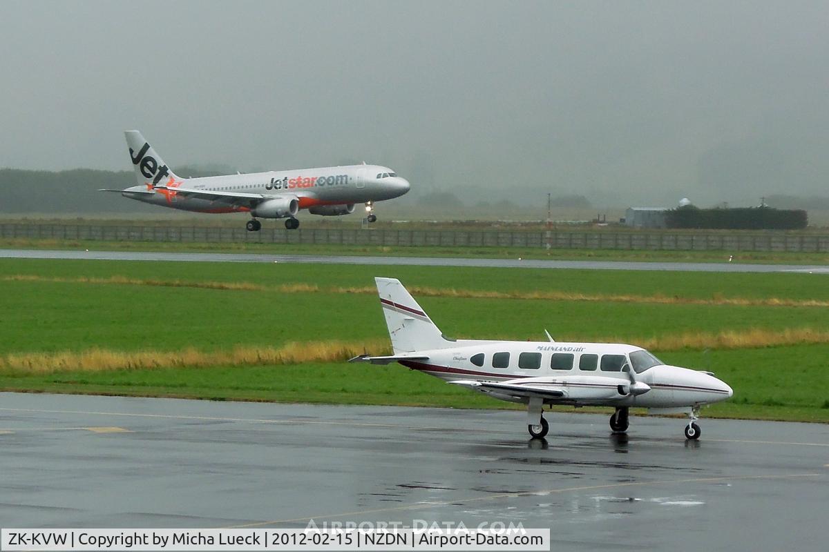 ZK-KVW, Piper PA-31-350 Chieftain C/N 31-7752004, VH-VGV in the back on this gloomy morning