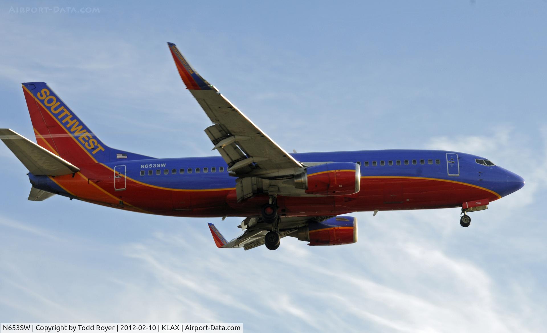 N653SW, 1997 Boeing 737-3H4 C/N 28398, Arriving on 24R