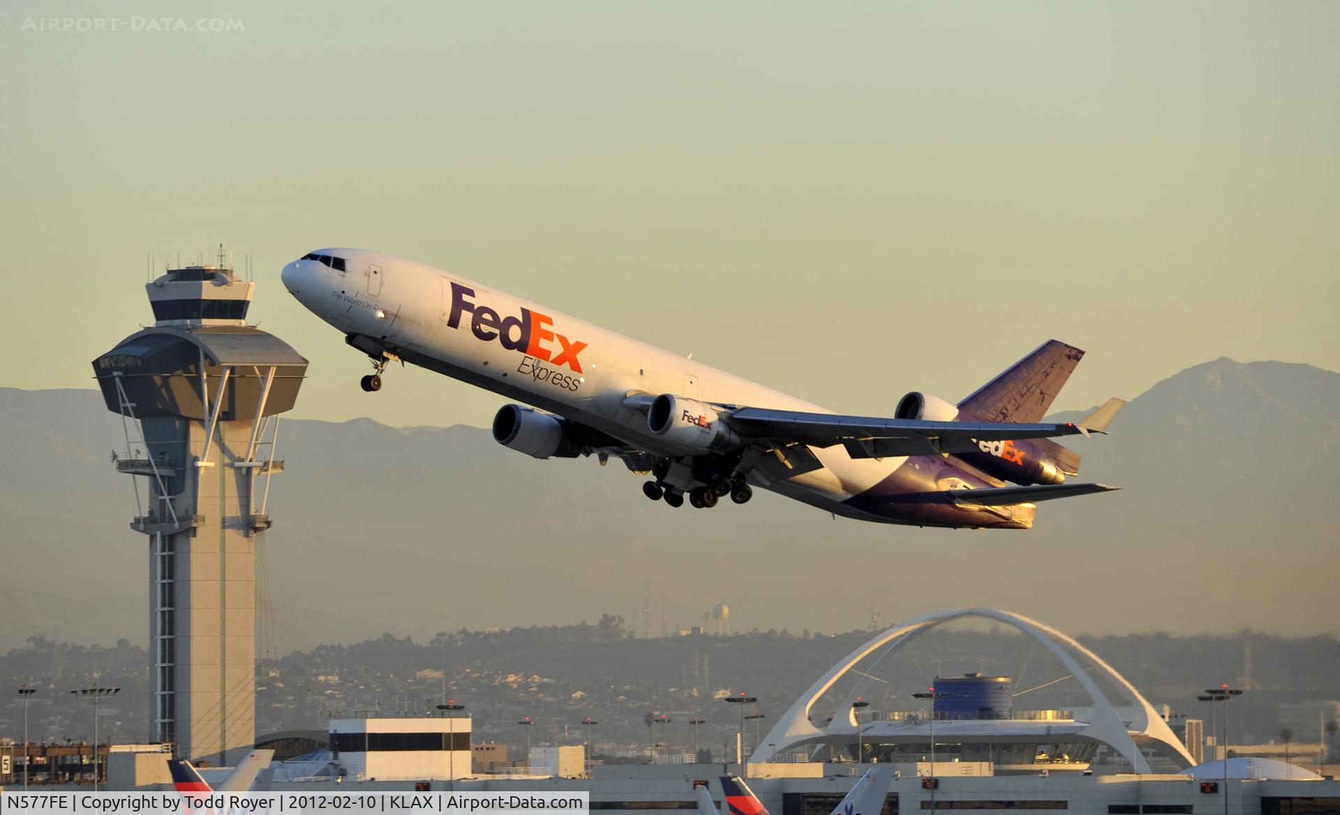N577FE, 1992 McDonnell Douglas MD-11F C/N 48469, Departing LAX on 25R