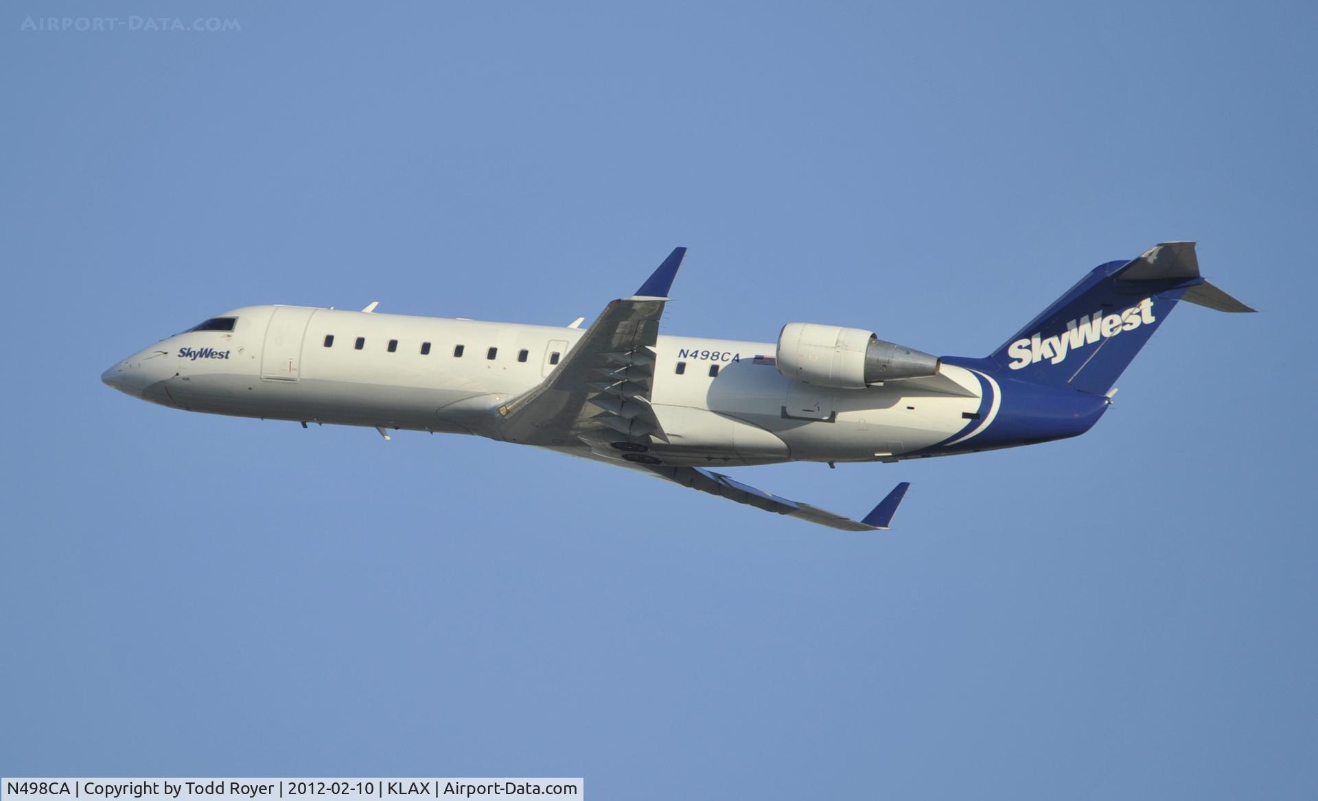 N498CA, 2003 Bombardier CRJ-200ER (CL-600-2B19) C/N 7792, Departing LAX on 25R