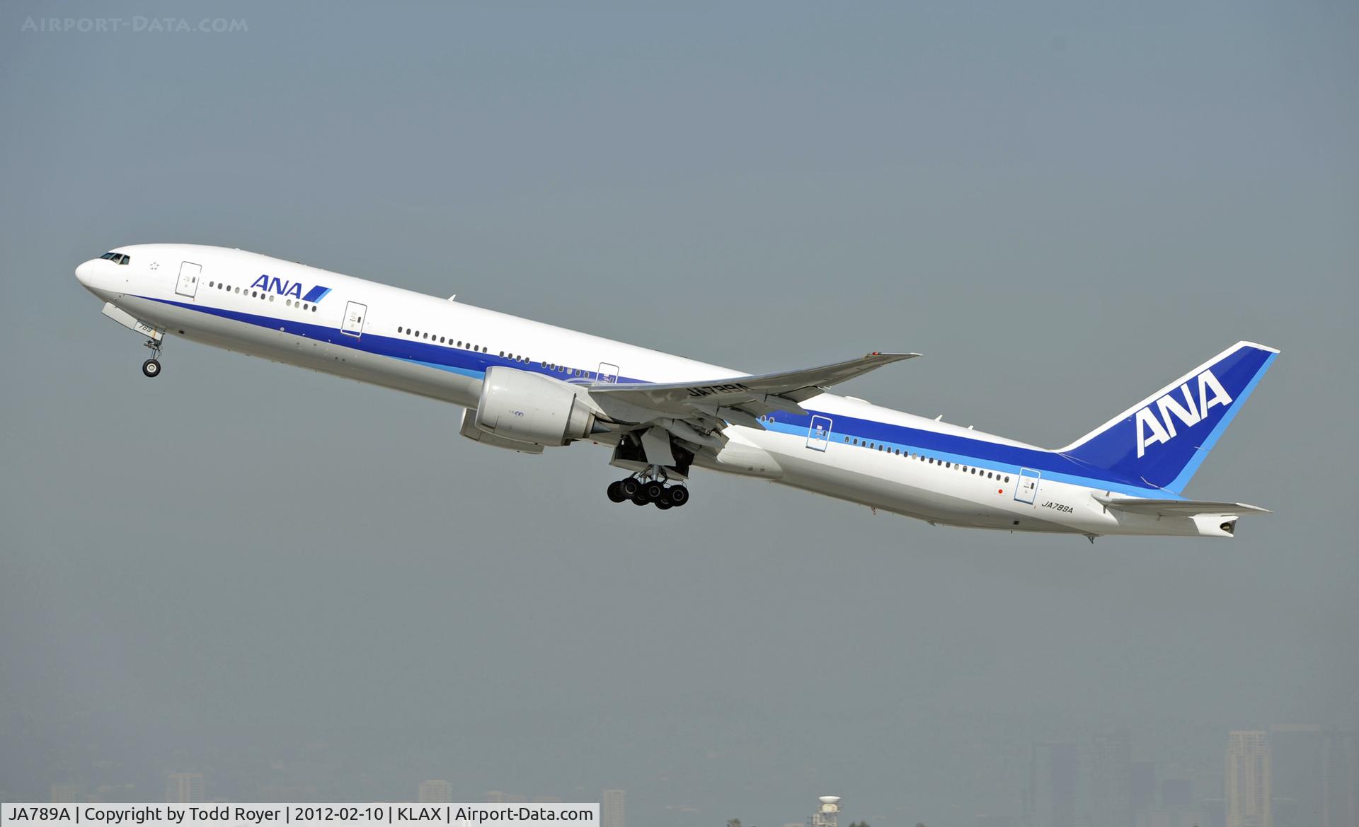 JA789A, 2010 Boeing 777-381/ER C/N 40687, Departing LAX on 25R