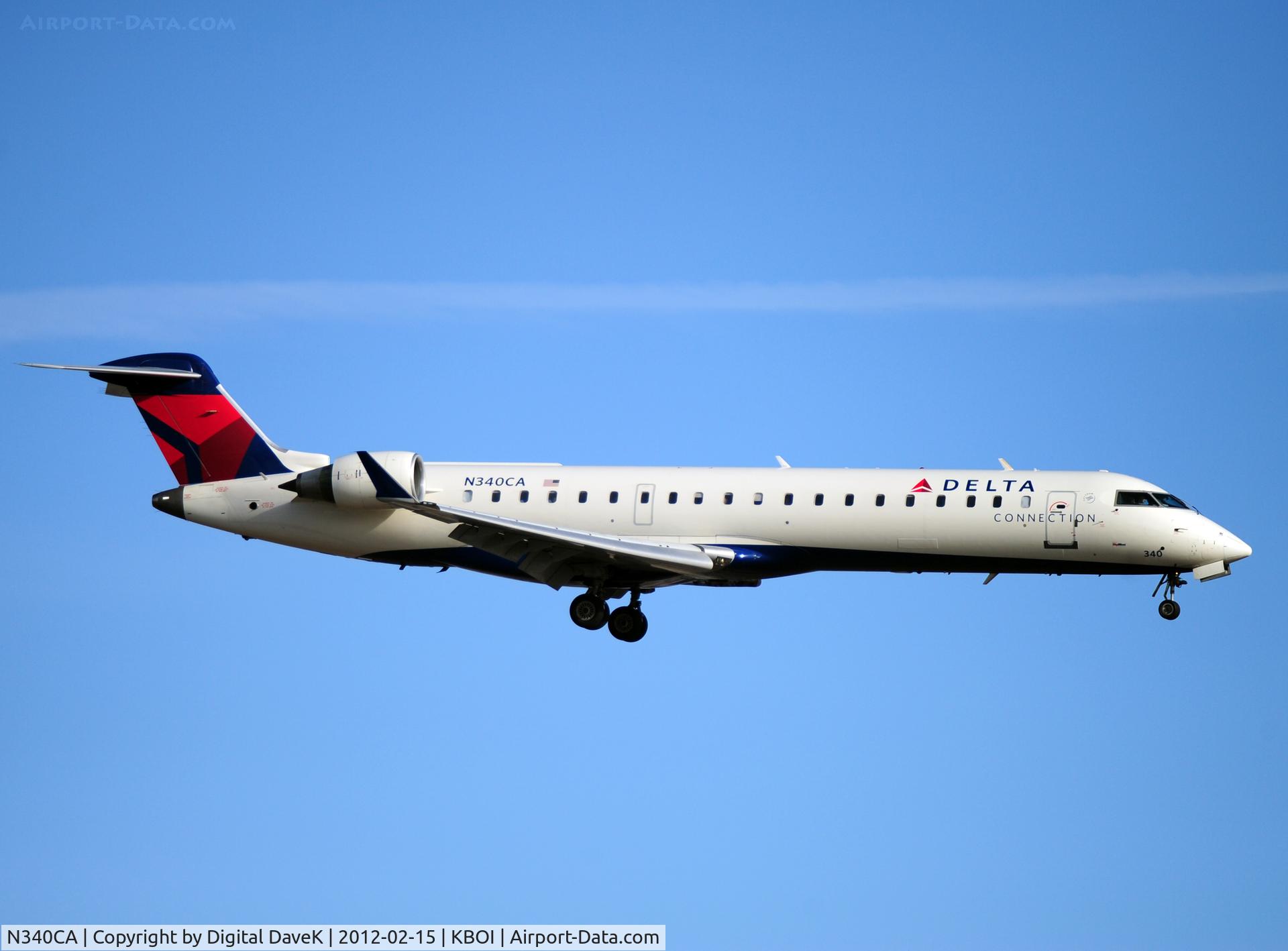 N340CA, 2002 Bombardier CRJ-701ER (CL-600-2C10) Regional Jet C/N 10062, West approach @ KBOI