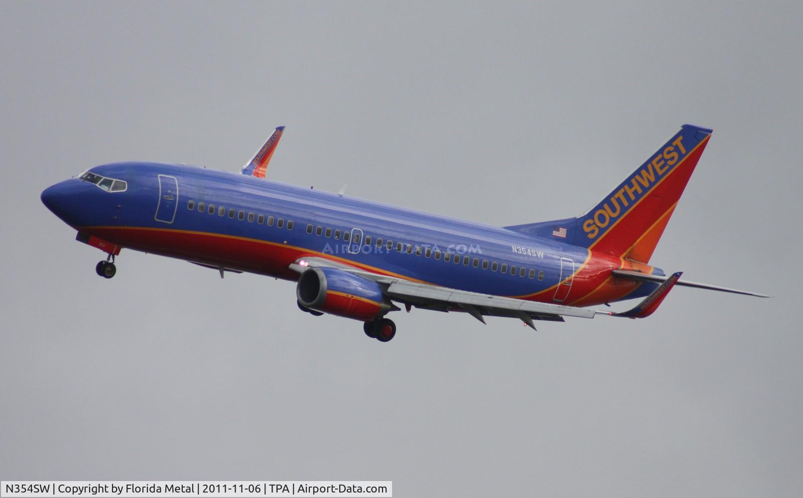 N354SW, 1991 Boeing 737-3H4 C/N 25219, Southwest 737 doing Kai Tak style approach at Tampa Runway 1L due to nearby airshow at MacDill