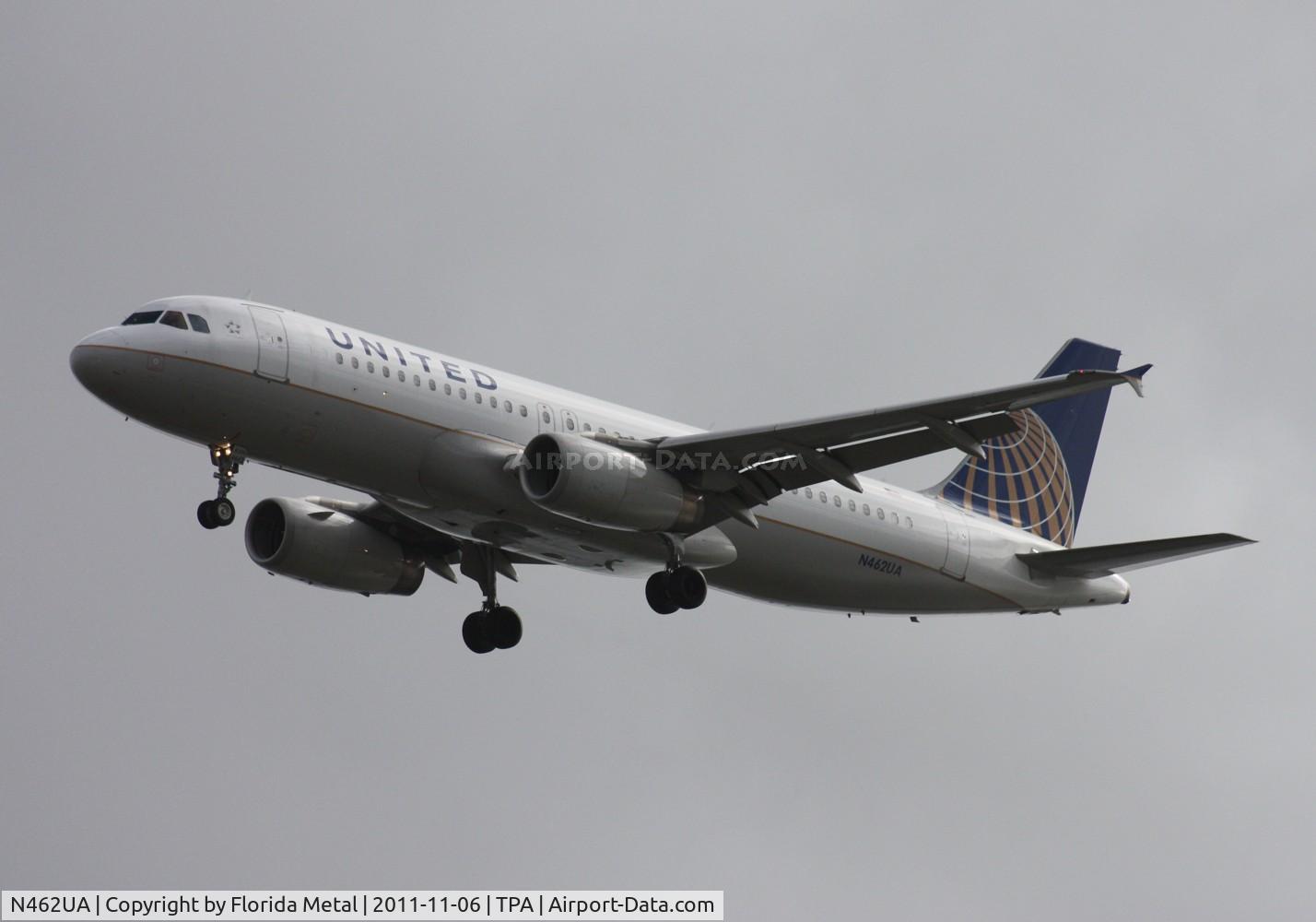 N462UA, 2000 Airbus A320-232 C/N 1272, United A320 doing Kai Tak style approach - aircraft would fly parallel with the Howard Frankland Bridge before turning last second onto Runway 1L - due to airshow at nearby MacDill AFB
