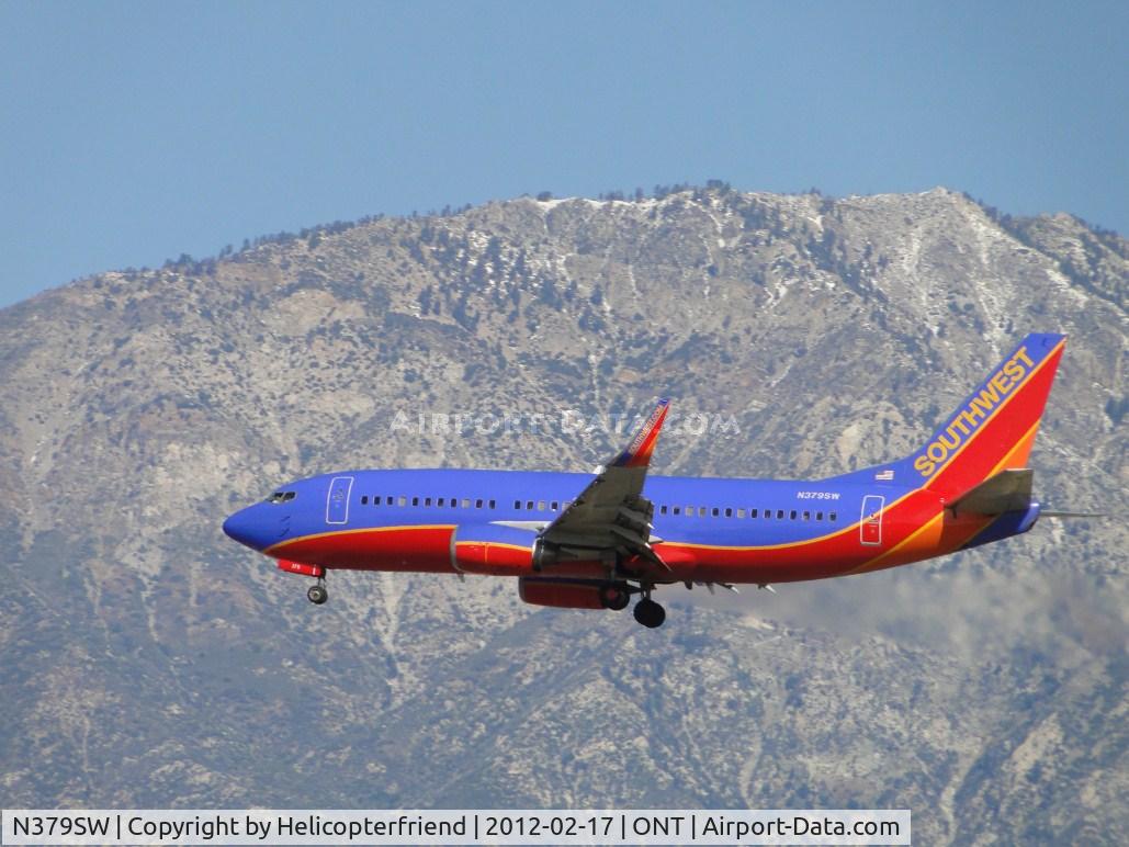 N379SW, 1994 Boeing 737-3H4 C/N 26586, On final for runway 26R