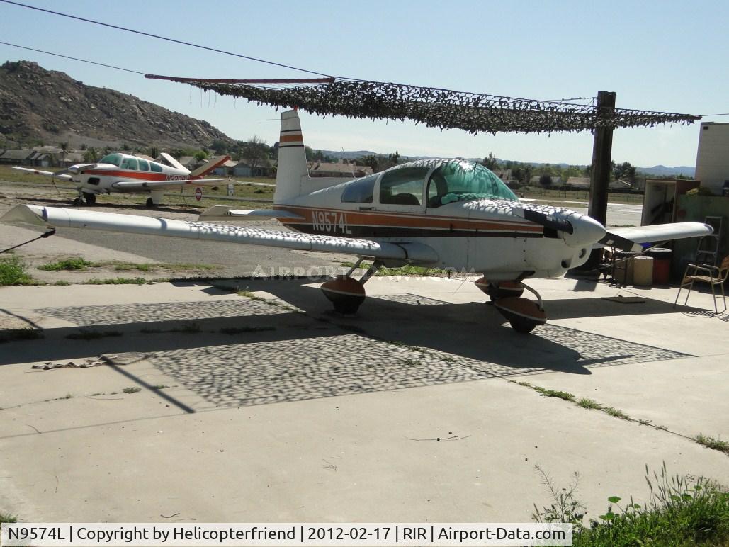 N9574L, 1974 Grumman American AA-5 Traveler C/N AA5-0574, Parked on the north east side under a shaded area