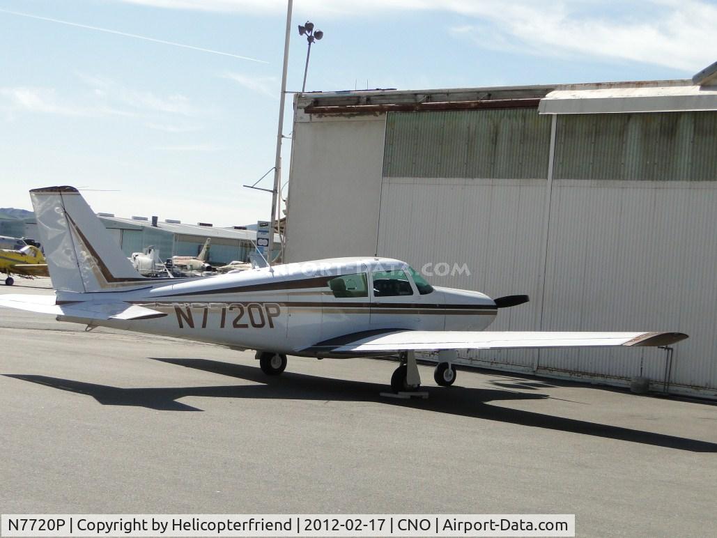N7720P, 1961 Piper PA-24-250 Comanche C/N 24-2933, Parked by a hanger