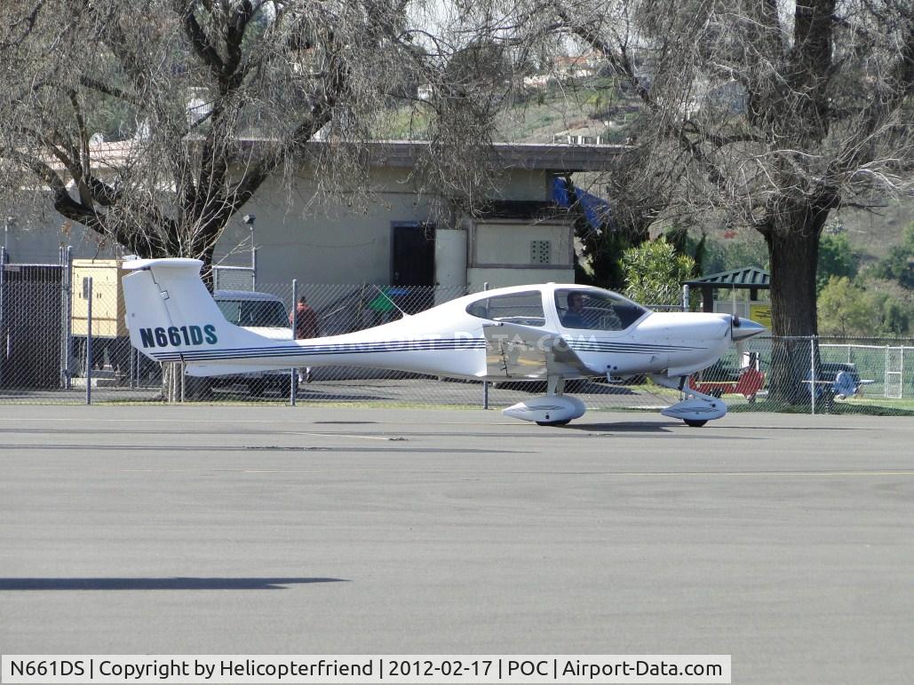 N661DS, 2005 Diamond DA-40 Diamond Star C/N 40.600, Taxiing out of transient parking enroute runway 26L