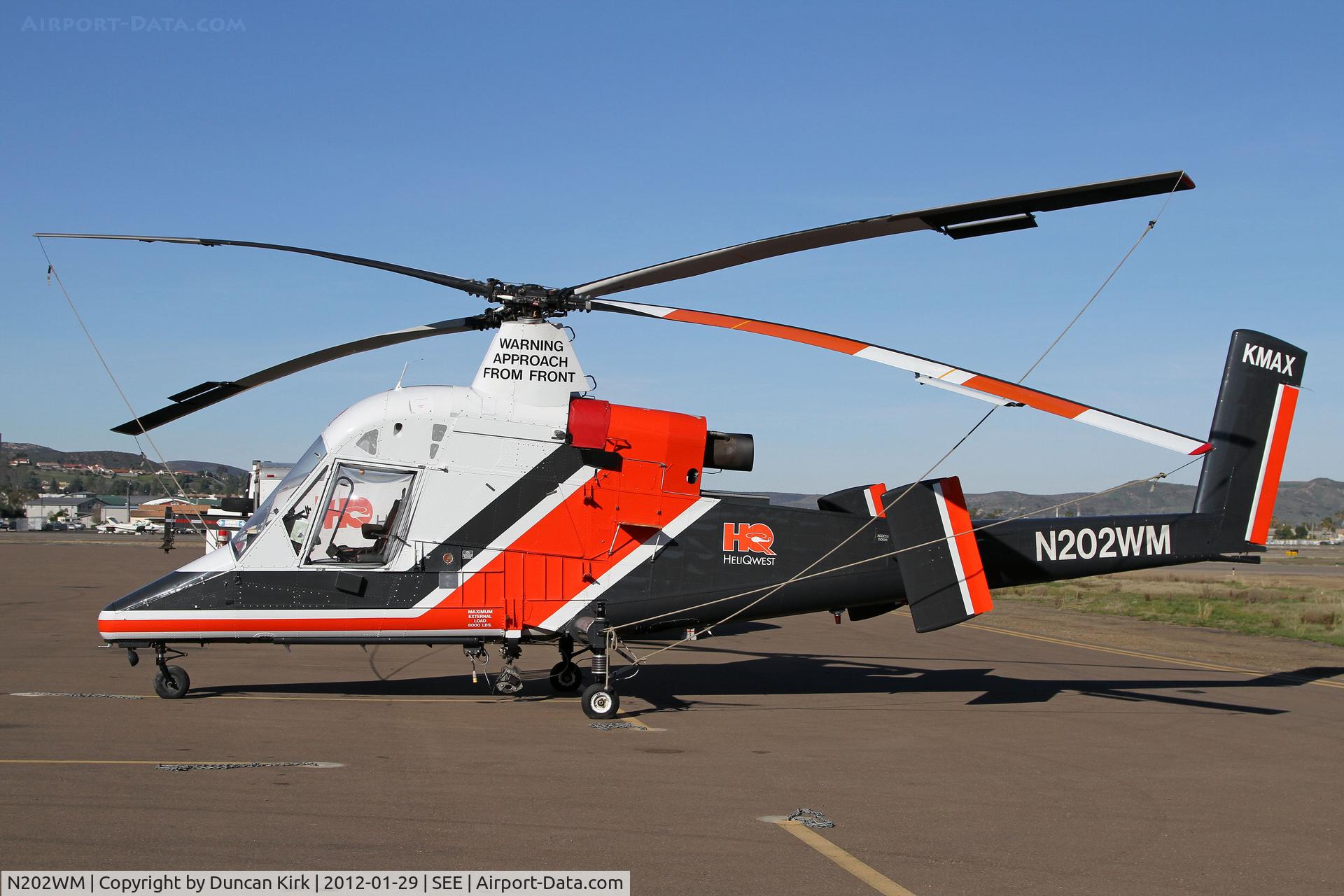N202WM, 1995 Kaman K-1200 K-Max C/N A94-0011, HeliQuest Kaman, one of two parked together at Gillespie