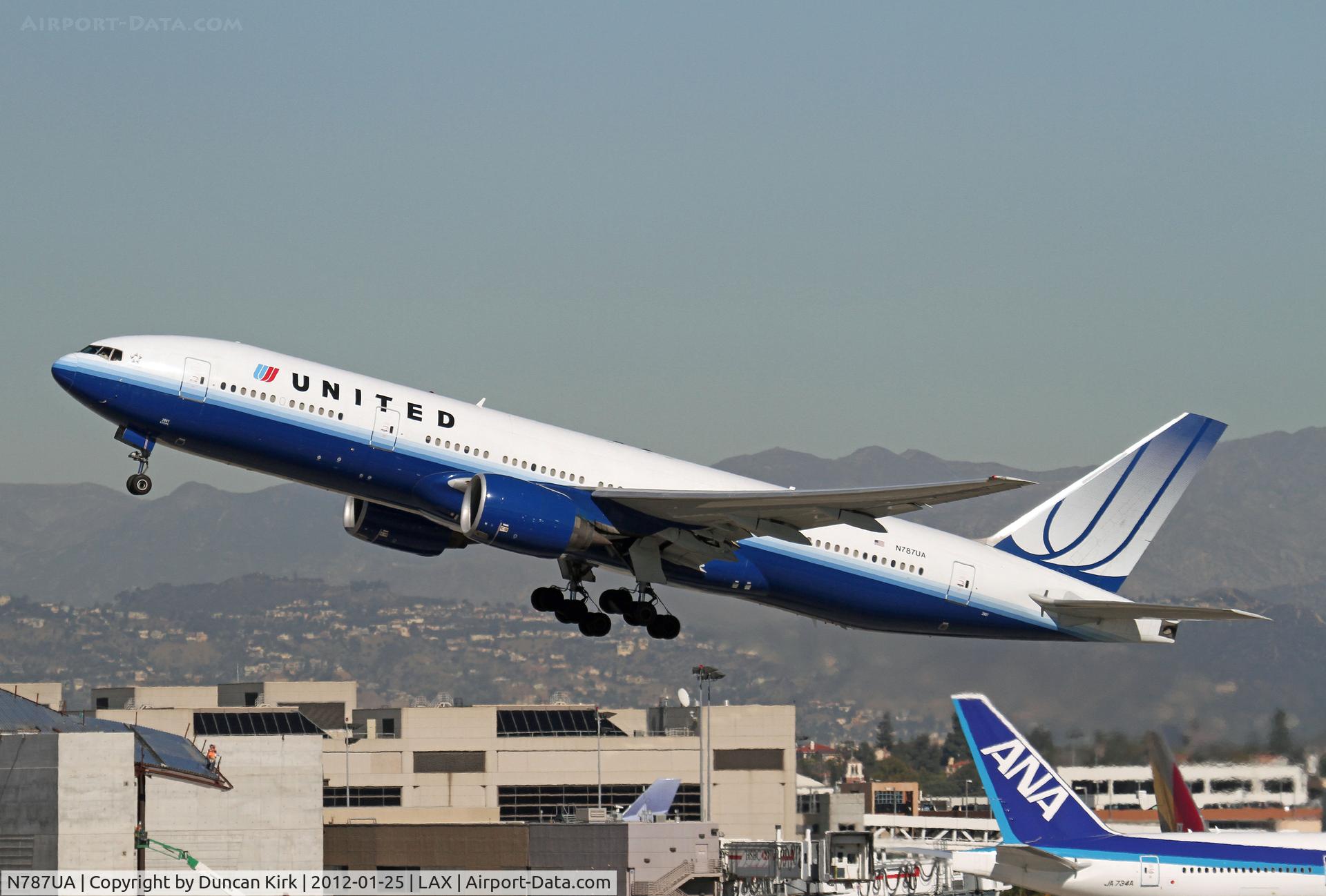 N787UA, 1997 Boeing 777-222 C/N 26939, Nice take-off shot of a UA B.777