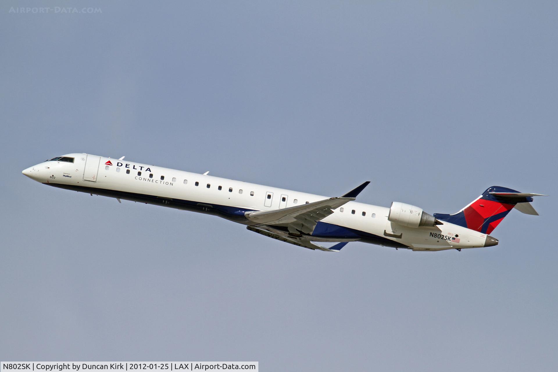 N802SK, 2006 Canadair CL-600-2D24 Regional Jet CRJ-900 C/N 15061, Another Delta regional jet heads out of LAX