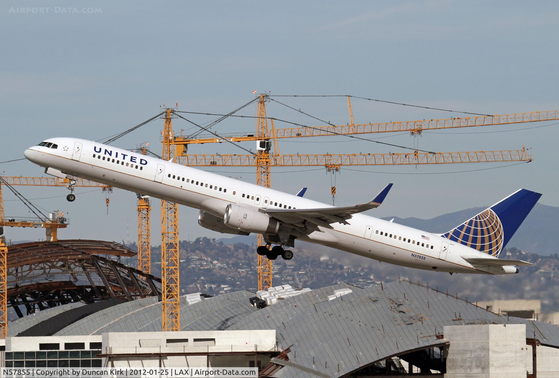 N57855, 2004 Boeing 757-324 C/N 32814, Long and spindely!  The new LAX terminal is under construction in the backgroundn