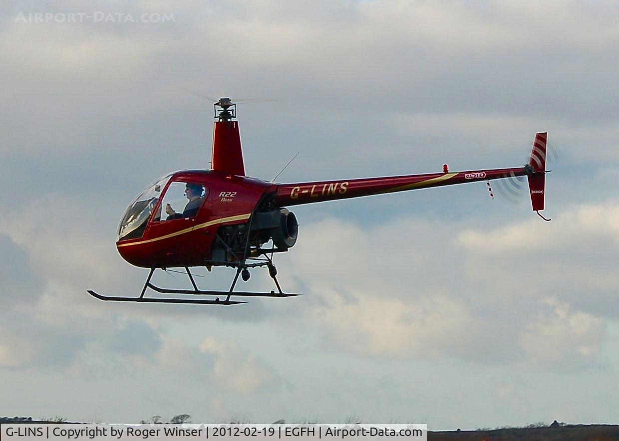 G-LINS, 1989 Robinson R22 Beta C/N 1201, Resident  R-22 operated by Heli-air Wales.