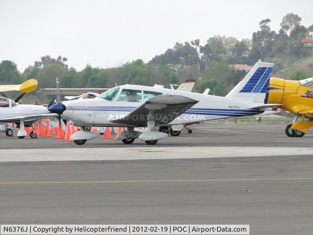 N6376J, 1968 Piper PA-28-180 C/N 28-4789, Turning into transient parking area by fueling station