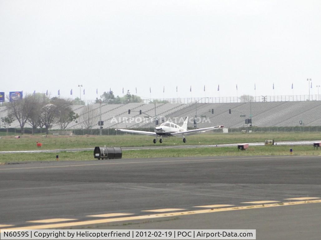 N6059S, 1976 Beech 58P Baron C/N TJ-49, Getting ready to touch down on 26L