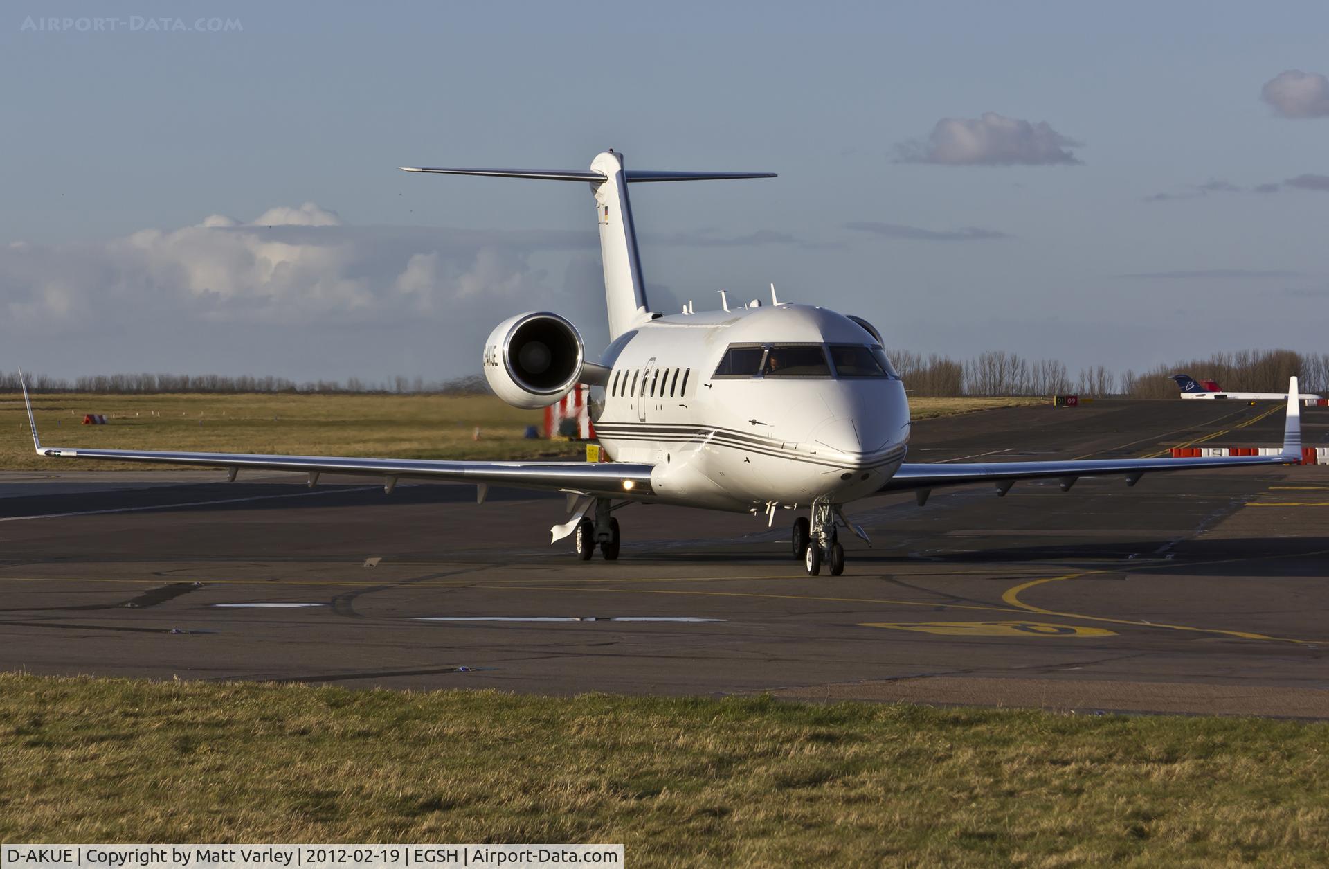 D-AKUE, 1995 Canadair Challenger 601-3R (CL-600-2B16) C/N 5173, Taxiing away from SaxonAir in the late evening sun.