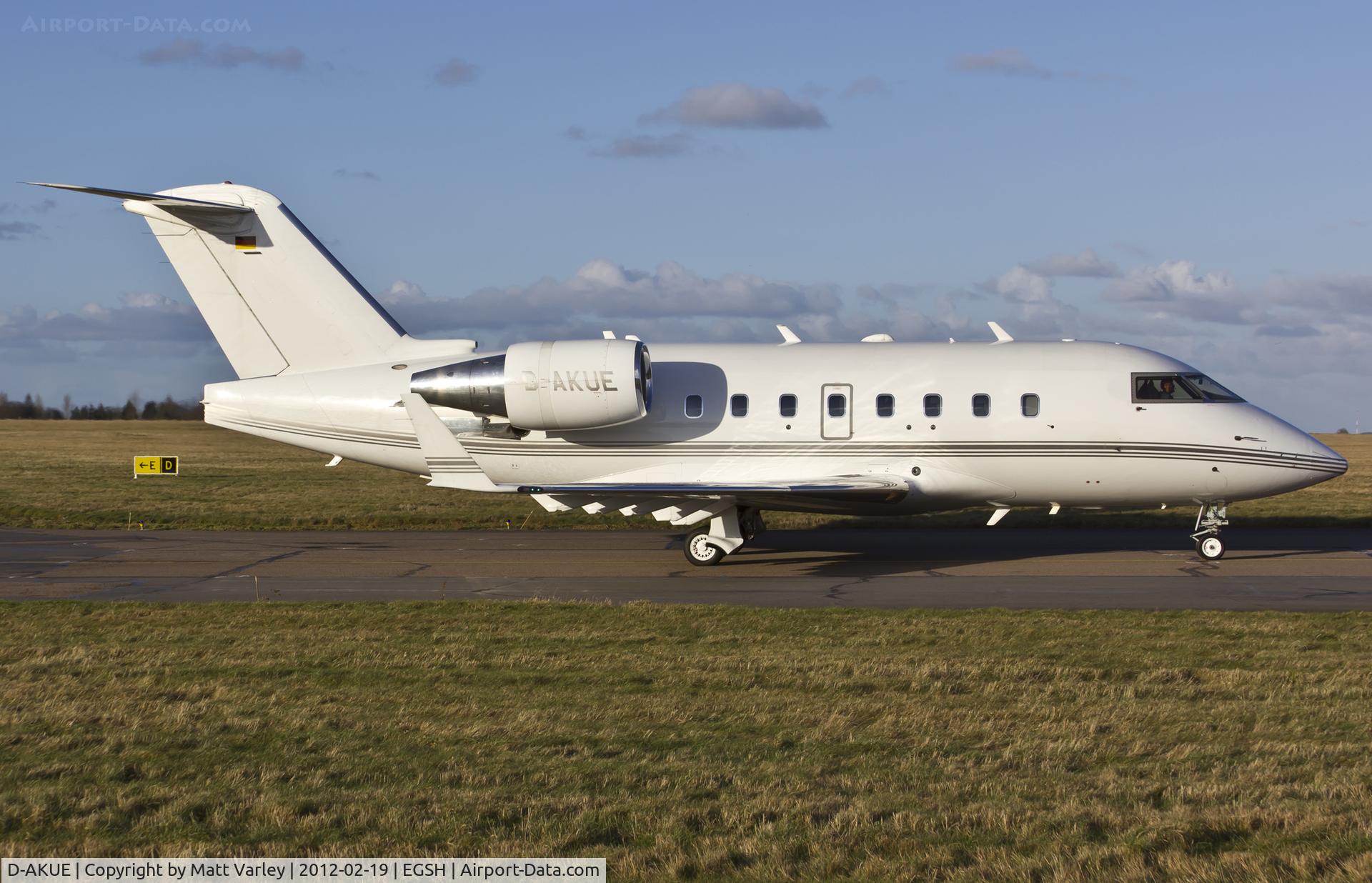 D-AKUE, 1995 Canadair Challenger 601-3R (CL-600-2B16) C/N 5173, Taxiing away from SaxonAir in the late evening sun.