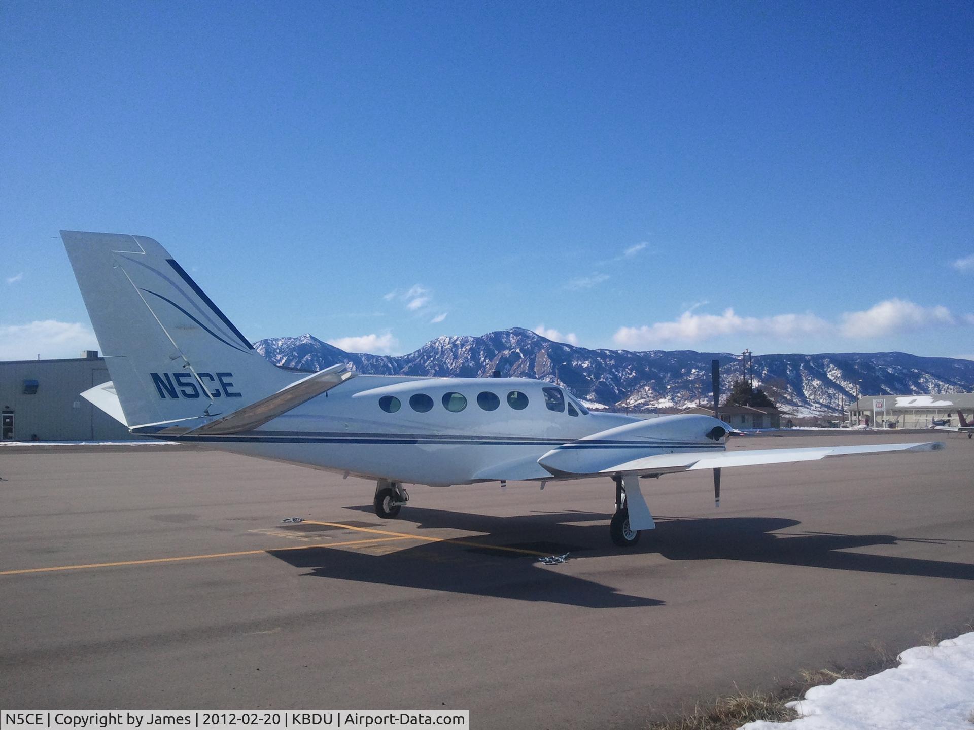 N5CE, 1981 Cessna 425 Conquest I C/N 425-0135, New paint job. Flatirons in the background.